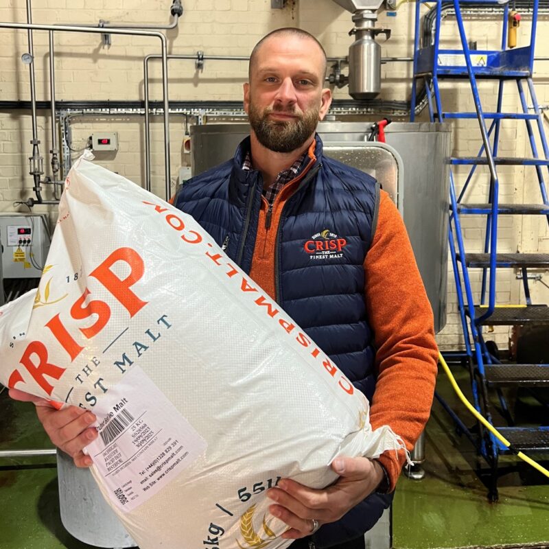 Meet Josh Wurzbacher our Technical Sales Manager in the USA, holding a malt sack in a brewery.