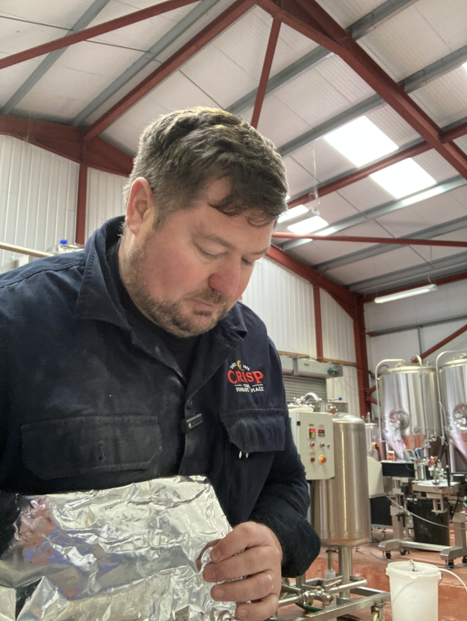 Mike the Craft Sales Brewing Manager at Crisp helps on the beer collab at RedWillow Brewery in Cheshire